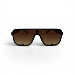 Sunglasses with a black frame and gradient brown lenses on a white background
